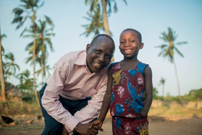 Kupenda for the Children Co-Founder and Kenya Executive Director, Leonard Mbonani, assists a child with a disability. (Photo by Philip Knowlton)